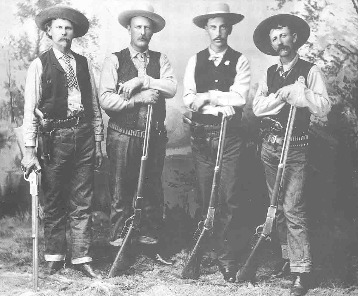 The Diablo Canyon Posse included Carl Holton (1), Jim Black (2) and Ed St. Clair (4) with Model 76 Winchesters. Sheriff William “Buckey” O’Neill (3) holds a Model 86.